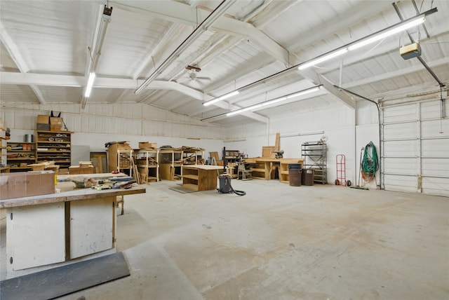 421 Olive Branch Rd, Brock, TX 76087 - garage featuring a workshop area and a garage door opener