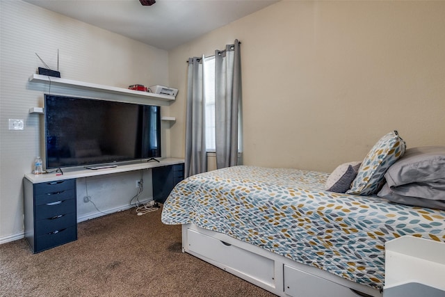 2446 Catherine St, Dallas, TX 75211 - bedroom with dark carpet, a desk, and baseboards