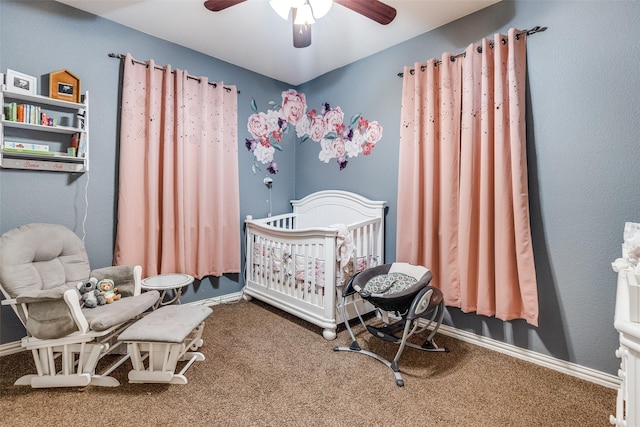 2446 Catherine St, Dallas, TX 75211 - bedroom featuring carpet floors, a nursery area, a ceiling fan, and baseboards