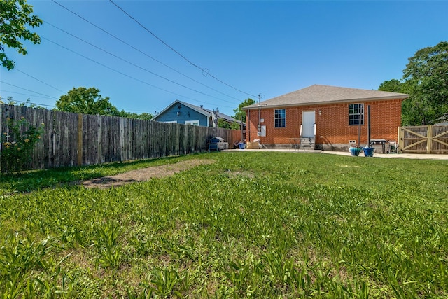 2446 Catherine St, Dallas, TX 75211 - rear view of house with brick siding and entry steps
