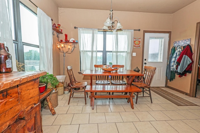 4109 Seminole Trl, Granbury, TX 76048 - dining space with a chandelier and light tile patterned floors