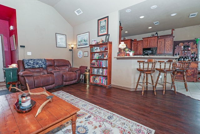 4109 Seminole Trl, Granbury, TX 76048 - living area with wood finished floors, lofted ceiling, and recessed lighting