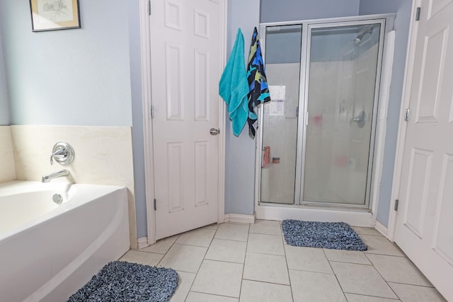 4109 Seminole Trl, Granbury, TX 76048 - full bathroom with a shower stall, a bath, and tile patterned flooring