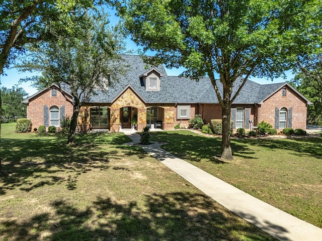 103 Marina Del Ray, Bridgeport, TX 76426 - view of front of property with brick siding and a front yard