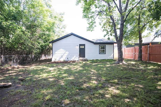 916 Wilde St, Denison, TX 75020 - rear view of property featuring entry steps