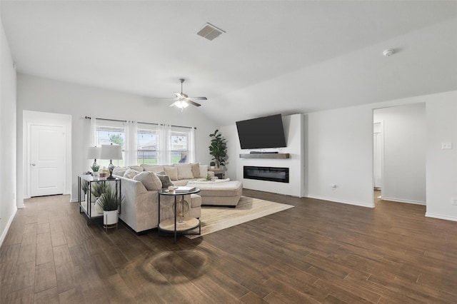 1417 Grassy Meadows Dr, Burleson, TX 76058 - living room featuring ceiling fan, dark wood-style floors, a glass covered fireplace, baseboards, and lofted ceiling