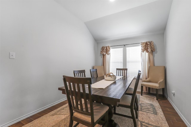 1417 Grassy Meadows Dr, Burleson, TX 76058 - dining space with lofted ceiling, wood finished floors, and baseboards