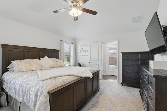 1417 Grassy Meadows Dr, Burleson, TX 76058 - bedroom featuring light carpet, vaulted ceiling, and a ceiling fan