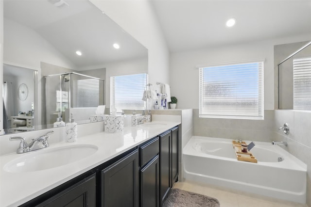 1417 Grassy Meadows Dr, Burleson, TX 76058 - bathroom with a bath, a shower stall, double vanity, lofted ceiling, and tile patterned flooring
