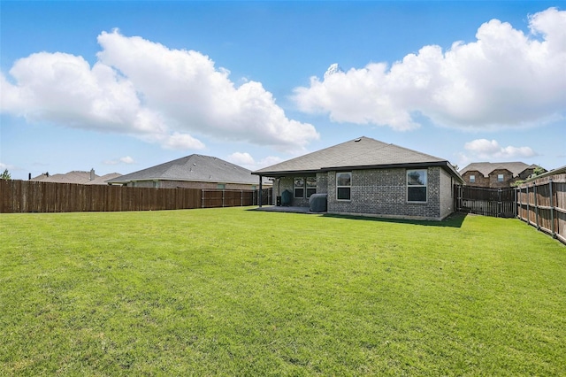 1417 Grassy Meadows Dr, Burleson, TX 76058 - rear view of house featuring a patio and brick siding