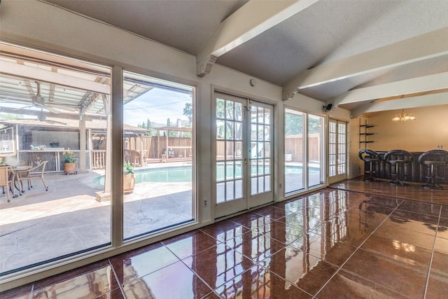 3984 Goodfellow Dr, Dallas, TX 75229 - sunroom / solarium with vaulted ceiling and a chandelier