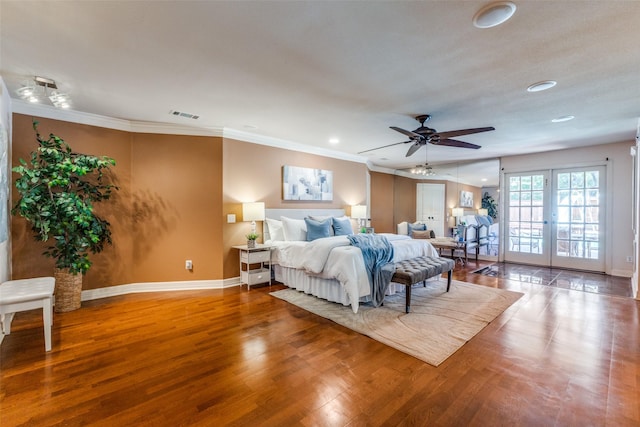 3984 Goodfellow Dr, Dallas, TX 75229 - bedroom with baseboards, wood finished floors, recessed lighting, ornamental molding, and french doors