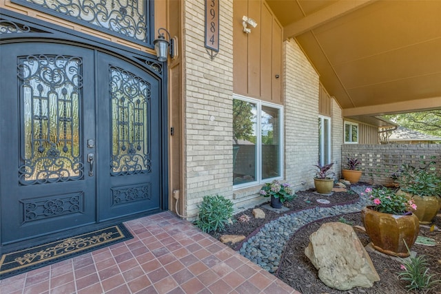 3984 Goodfellow Dr, Dallas, TX 75229 - entrance to property with brick siding, french doors, and covered porch