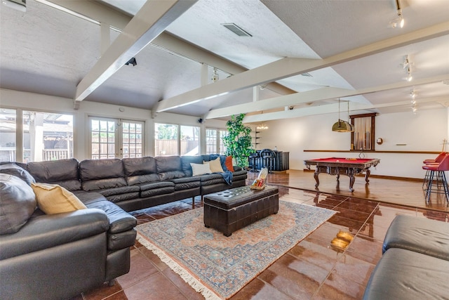 3984 Goodfellow Dr, Dallas, TX 75229 - tiled living room featuring billiards table, rail lighting, baseboards, and a textured ceiling