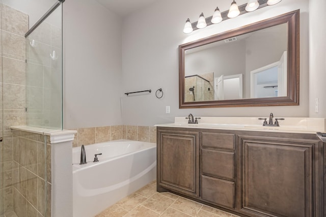 628 Cottage Pl, Lavon, TX 75166 - bathroom with tiled shower, double vanity, and a garden tub