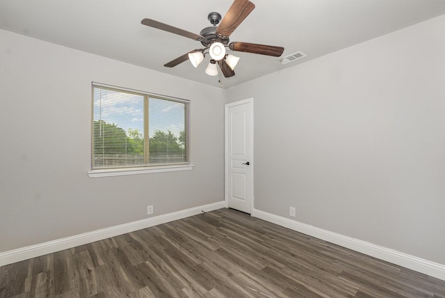 628 Cottage Pl, Lavon, TX 75166 - unfurnished room featuring dark wood finished floors, baseboards, and a ceiling fan