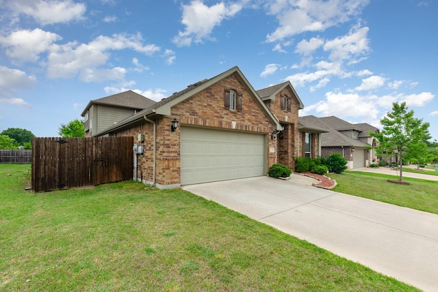 628 Cottage Pl, Lavon, TX 75166 - traditional-style house with brick siding, an attached garage, and driveway
