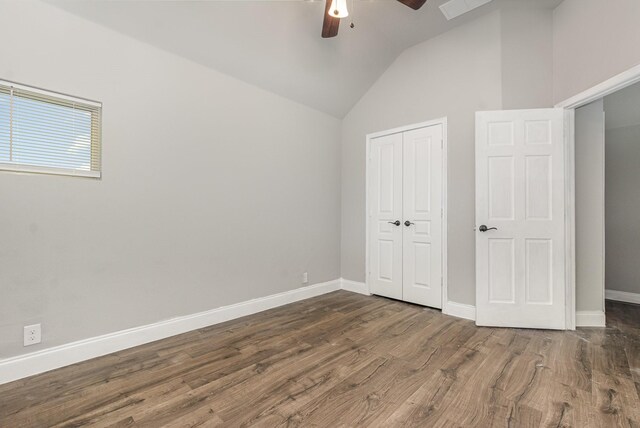 628 Cottage Pl, Lavon, TX 75166 - unfurnished bedroom featuring vaulted ceiling, wood finished floors, a closet, baseboards, and ceiling fan