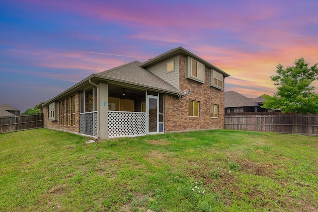 628 Cottage Pl, Lavon, TX 75166 - back of house featuring brick siding, a sunroom, and roof with shingles