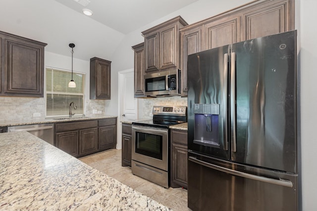628 Cottage Pl, Lavon, TX 75166 - kitchen with appliances with stainless steel finishes, backsplash, a sink, dark brown cabinets, and vaulted ceiling