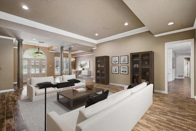 5020 Still Meadow Dr, Fort Worth, TX 76132 - living area with ornate columns, crown molding, baseboards, wood finished floors, and recessed lighting