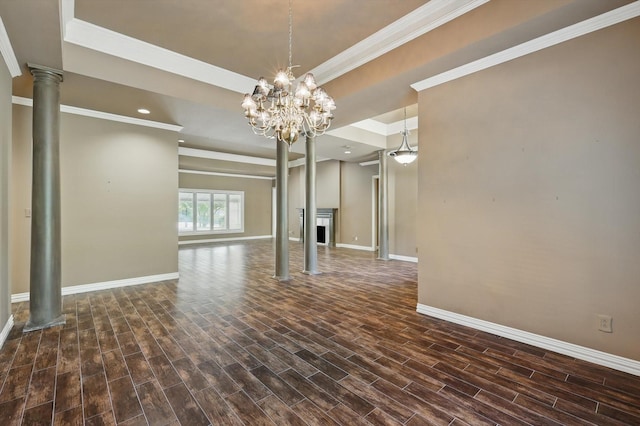 5020 Still Meadow Dr, Fort Worth, TX 76132 - spare room featuring baseboards, wood finished floors, ornate columns, a fireplace, and crown molding