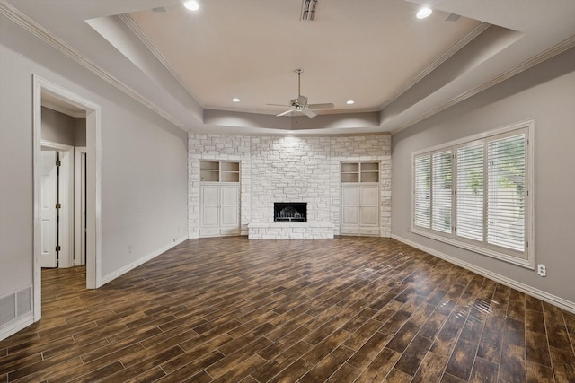 5020 Still Meadow Dr, Fort Worth, TX 76132 - unfurnished living room featuring a tray ceiling, a ceiling fan, dark wood-style floors, ornamental molding, and baseboards
