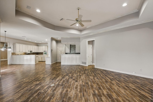 5020 Still Meadow Dr, Fort Worth, TX 76132 - unfurnished living room with a raised ceiling, ceiling fan, dark wood-type flooring, crown molding, and recessed lighting