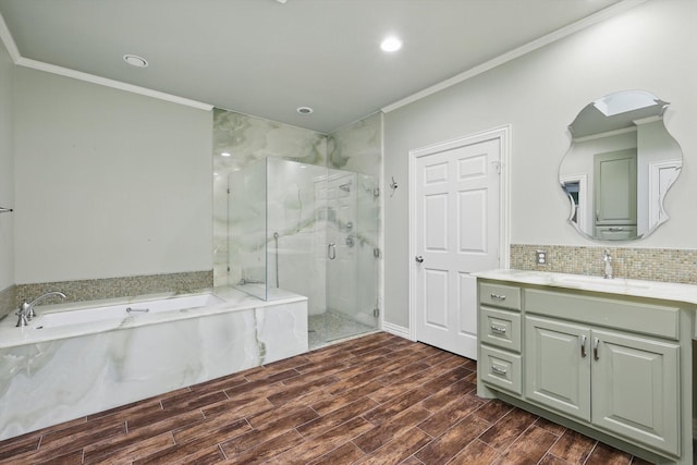 5020 Still Meadow Dr, Fort Worth, TX 76132 - full bath with a marble finish shower, ornamental molding, a garden tub, vanity, and wood finished floors