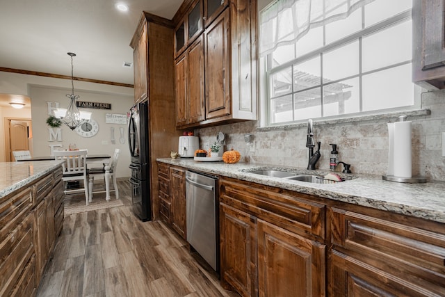 3547 County Road 1092, Celeste, TX 75423 - kitchen featuring dishwasher, freestanding refrigerator, a sink, decorative backsplash, and ornamental molding
