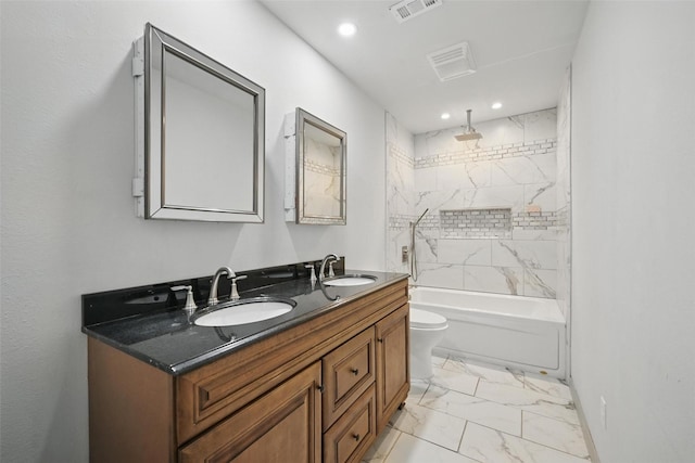 1043 Star St, Denison, TX 75020 - full bathroom featuring marble finish floors, double vanity, toilet, a combined bath / shower with rainfall shower, and recessed lighting