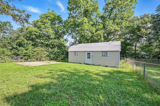 1043 Star St, Denison, TX 75020 - view of yard featuring an outbuilding