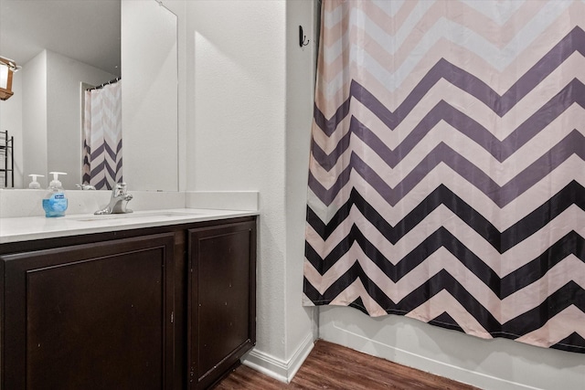 113 Hamilton Way, Venus, TX 76084 - bathroom with wood finished floors, vanity, a shower with shower curtain, and baseboards