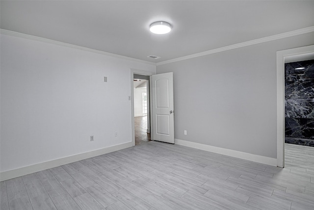 3408 Walton Ave, Fort Worth, TX 76133 - spare room with crown molding, light wood-style floors, and baseboards