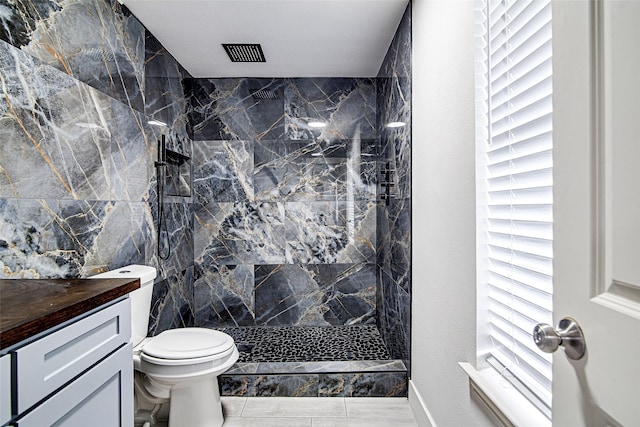 3408 Walton Ave, Fort Worth, TX 76133 - bathroom with plenty of natural light, a marble finish shower, toilet, and vanity