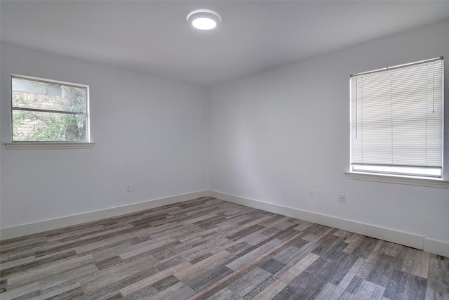 3408 Walton Ave, Fort Worth, TX 76133 - spare room with wood finished floors and baseboards