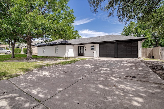 3408 Walton Ave, Fort Worth, TX 76133 - ranch-style home featuring an attached garage and driveway