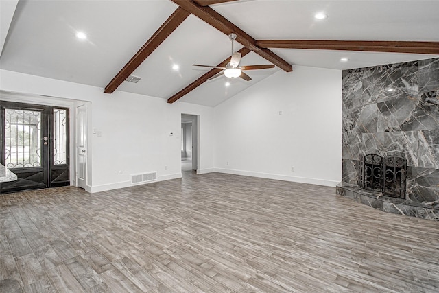 3408 Walton Ave, Fort Worth, TX 76133 - unfurnished living room with a stone fireplace, wood finished floors, ceiling fan, recessed lighting, and baseboards