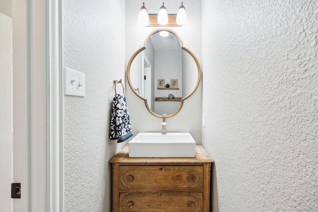 18818 Webb Ln, Nevada, TX 75173 - bathroom with a textured wall and vanity
