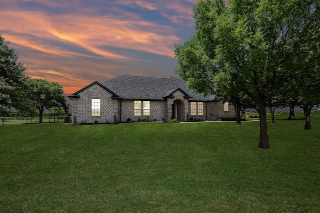18818 Webb Ln, Nevada, TX 75173 - view of front facade featuring brick siding, a shingled roof, and central AC unit