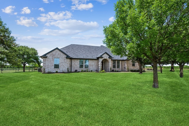 18818 Webb Ln, Nevada, TX 75173 - view of front facade with roof with shingles and brick siding