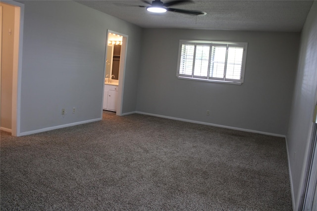 3026 San Miguel Dr, Abilene, TX 79605 - unfurnished bedroom featuring carpet floors, baseboards, ensuite bathroom, and a ceiling fan