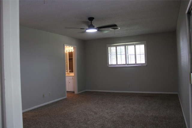 3026 San Miguel Dr, Abilene, TX 79605 - spare room featuring carpet floors, a ceiling fan, baseboards, a textured ceiling, and a sink