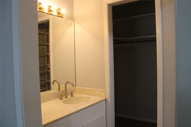 3026 San Miguel Dr, Abilene, TX 79605 - bathroom with vanity and a spacious closet