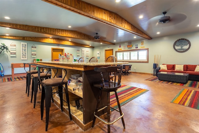 279 County Road 3470, Paradise, TX 76073 - bar area featuring finished concrete flooring, ceiling fan, baseboards, recessed lighting, and vaulted ceiling