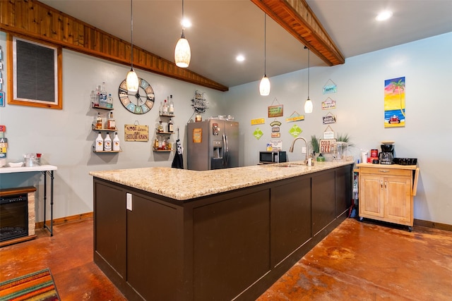 279 County Road 3470, Paradise, TX 76073 - kitchen featuring stainless steel appliances, finished concrete flooring, a sink, baseboards, and beam ceiling