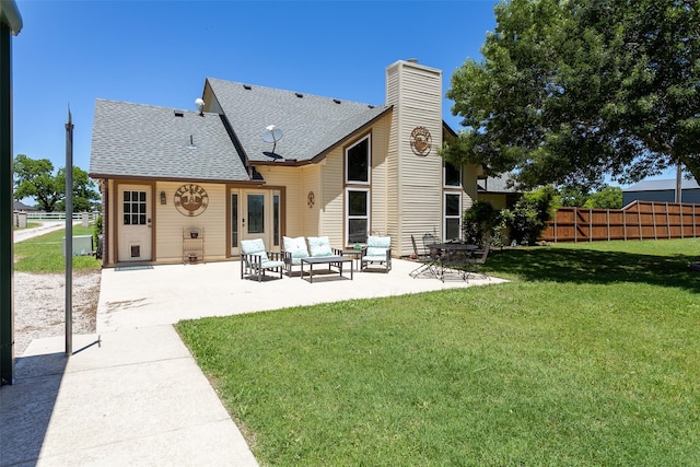 279 County Road 3470, Paradise, TX 76073 - back of house with a patio area, a chimney, roof with shingles, and an outdoor hangout area