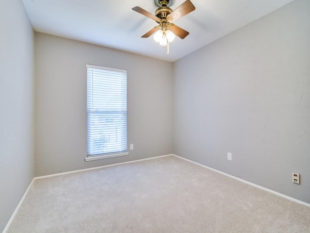 4552 Fremont Ln, Plano, TX 75093 - spare room featuring healthy amount of natural light, carpet floors, baseboards, and a ceiling fan