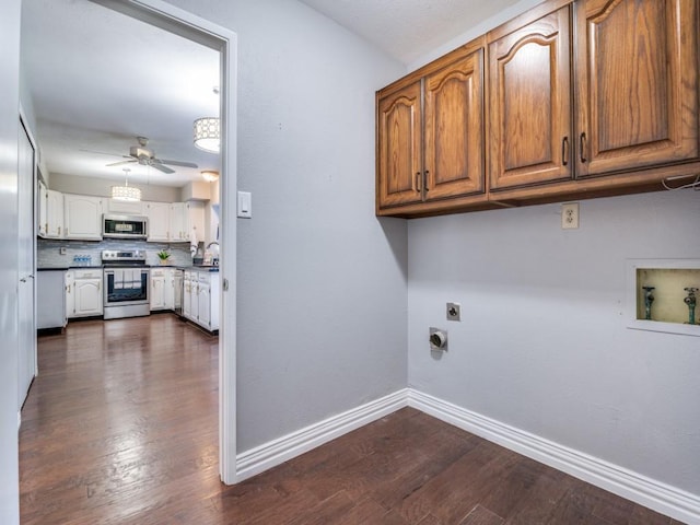 4552 Fremont Ln, Plano, TX 75093 - laundry room featuring electric dryer hookup, ceiling fan, dark wood-type flooring, baseboards, and washer hookup