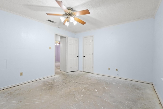 453 County Road 2521, Bonham, TX 75418 - spare room featuring ornamental molding, ceiling fan, concrete flooring, and a textured ceiling